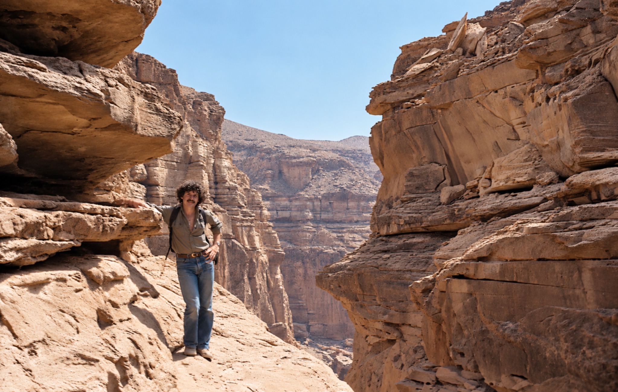 Michael Cassimaty standing in the Coloured Canyon during a Sinai trek, 1981